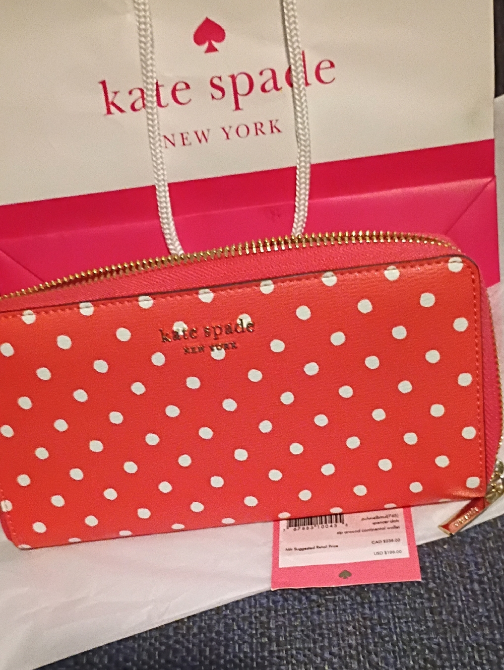 Kate Spade Coral with White Polka Dot Zip Around Wallet